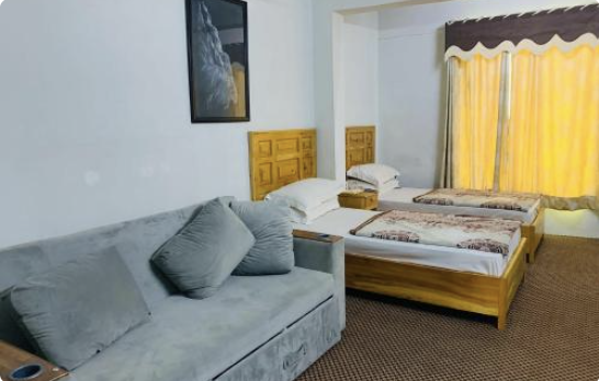 Guest room at Naveed Tourist Inn Gilgit