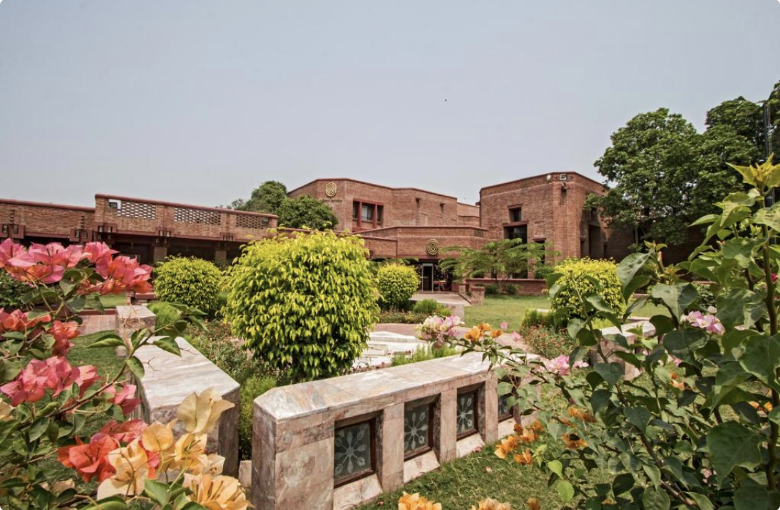 Garden courtyard and brick facade of Faisalabad Serena Hotel