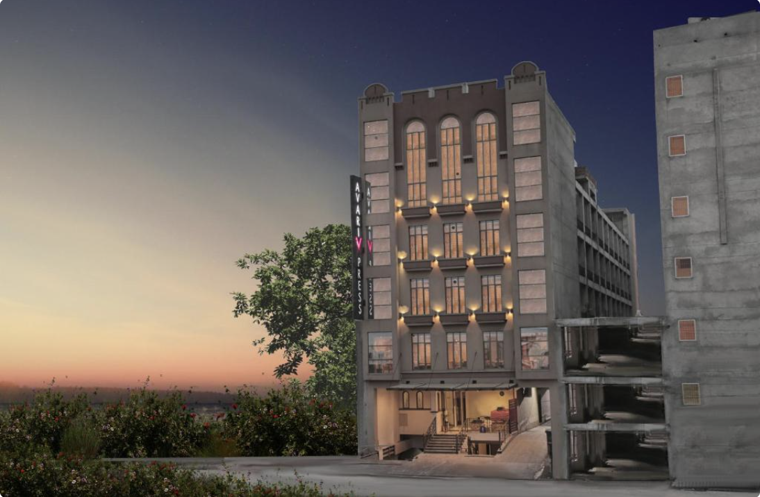 Exterior of Avari Xpress Faisalabad at dusk