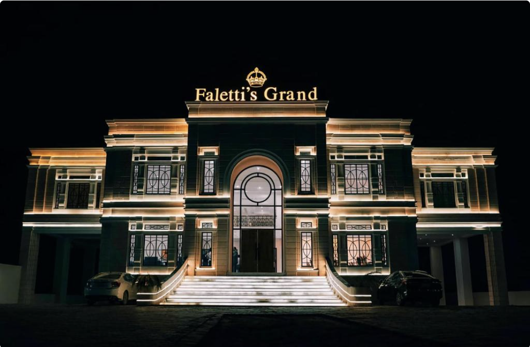 Falettis Grand Bahawalpur illuminated facade at night
